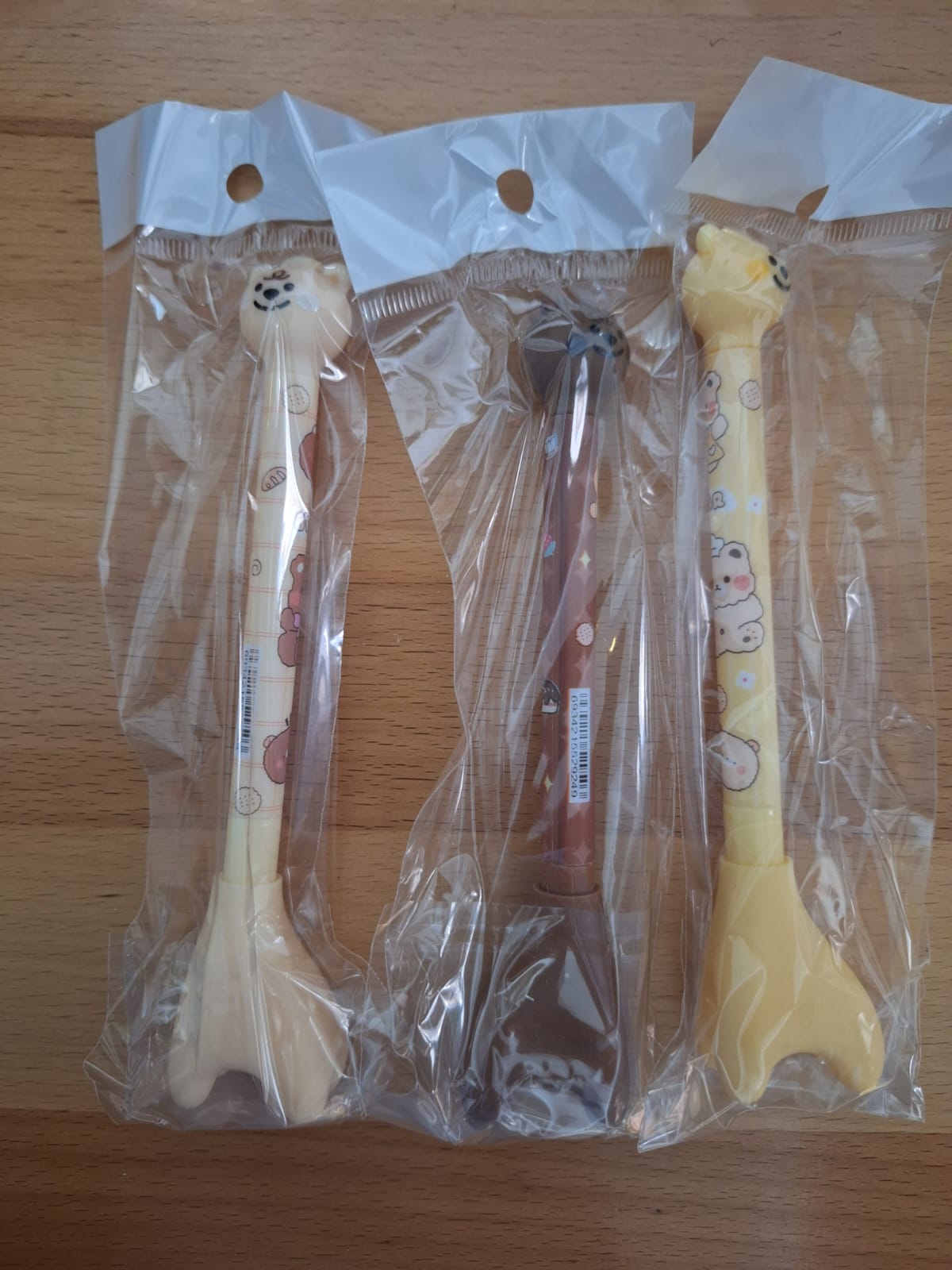 PLUMA DE JIRAFA / OSO