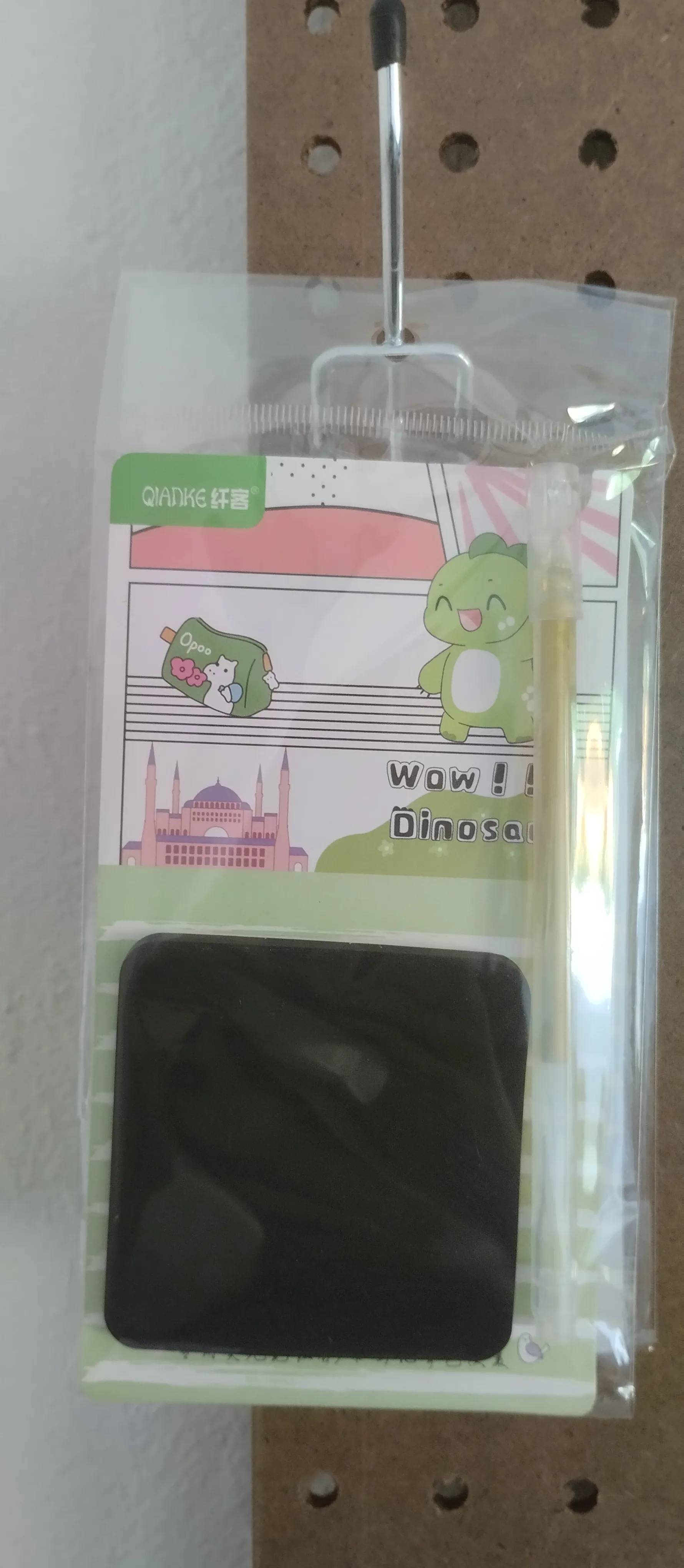 POSTICK NEGRO DINOSAURIO CON PLUMA